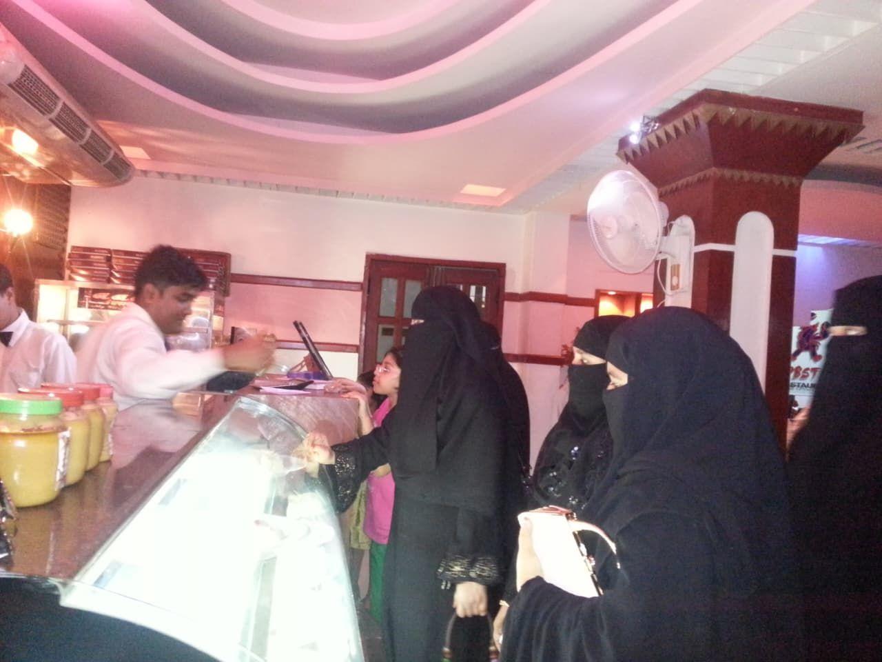 Guests at the bakery and dessert counter