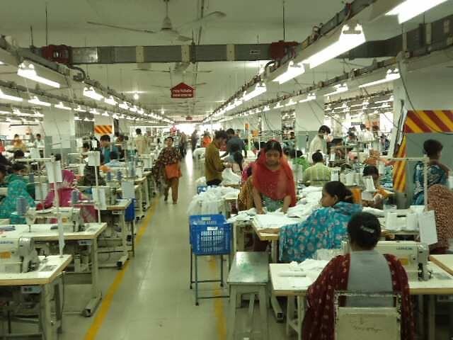 Sewing operators working along a production line